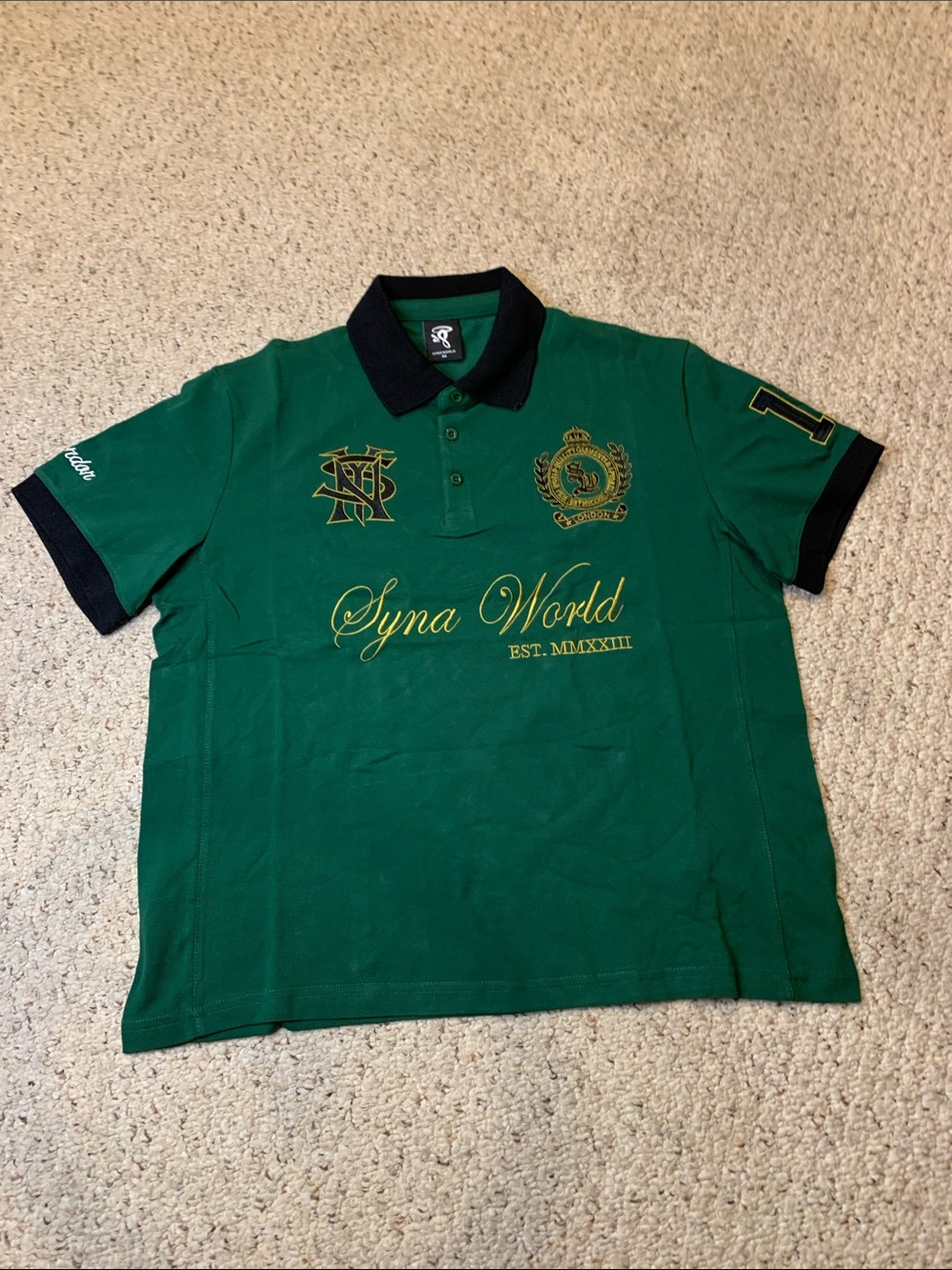 Others Follow Green Polo with Black Trim and Gold Embroidery